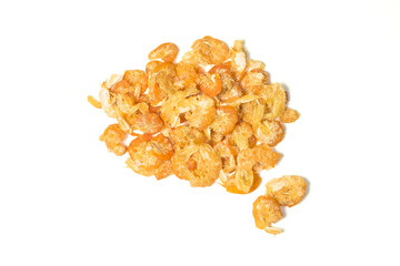 Heap of dried shrimp isolated on white background with clipping path top view flat lay. Sun dried seafood imparting a umami taste.