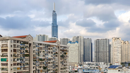 Fototapeta premium View Of Crowded Residential Apartments And Skyscraper In Ho Chi Minh City, Vietnam.