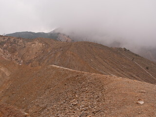 A mountain covered in dirt and rocks
