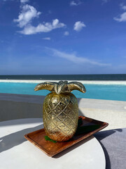 Pineapple juice, a refreshing drink with a sea view.