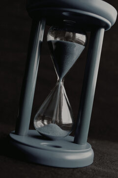 Detailed Stock Photo Of Black Time Glass With Flowing Sand Grayscale Stock Image