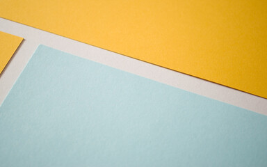 Light yellow and blue, divided with white lines, background, copy space