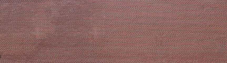 Old red brick wall background, wide panorama of masonry