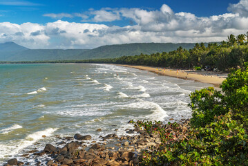 Majestic tropical golden sand Four Mile Beach in Port Douglas, Queensland, Australia. It is one of the most popular and well-known beaches in Tropical North Queensland.