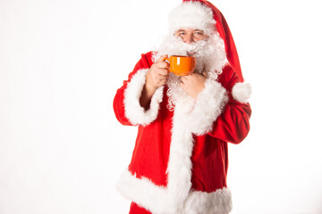 Santa Claus drinks hot coffee. White background.