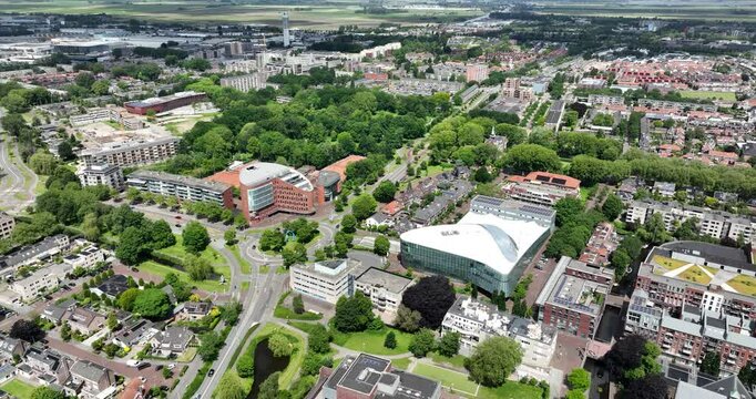 Aerial footage of the urban cityscape of Alphen aan den rijn on a sunny day in The Netherlands