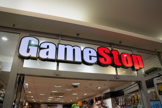 DRESDEN, GERMANY - 13. July 2024: GameStop logo sign of the retail gaming company. The store became popular because of the $GME stock short squeeze through the reddit sub wallstreetbets in 2021.