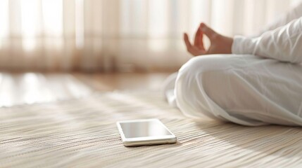 Person practicing guided meditation using a mobile app in a quiet room Stock Photo with copy space