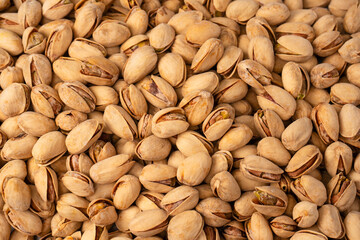 Tasty pistachios isolated on a white background.