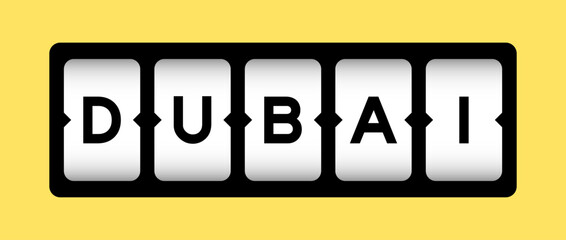 Black color in word dubai on slot banner with yellow color background