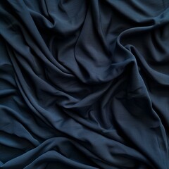 Fototapeta premium Dark blue fabric with elegant soft waves and folds