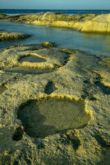 Whispers of the Tide: Chronicles of Stone and Sea