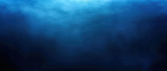 A deep blue underwater scene showing the calm yet mysterious depths of the ocean.