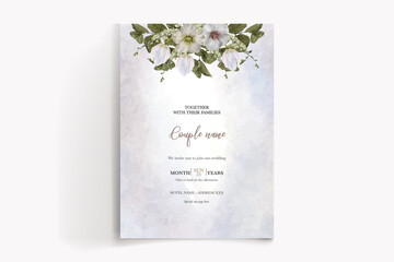 WEDDING INVITATION FRAME WITH FLOWER DECORATIONS AND FRESH LEAVES