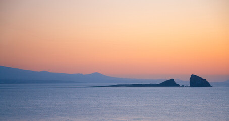 Sunrise at Yongmeori coast, view from base of Songaksan, Jeju, South Korea