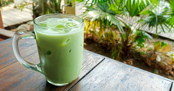 Fresh matcha latte iced tea drink at the cafe