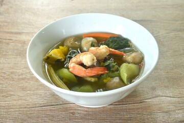 boiled spicy mixed vegetable with fresh shrimp soup on bowl