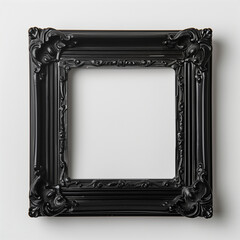 Black ornate empty picture frame on white background.