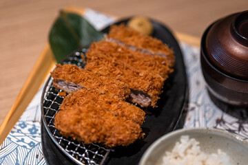 a close-up view of fried pork cutlet