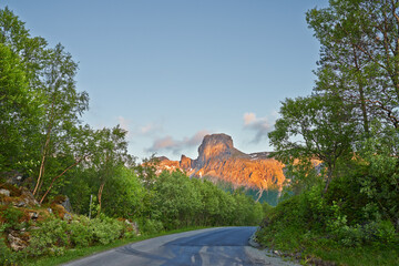 Mountain pass, road and travel with view of nature location for remote holiday or vacation. Forest,...