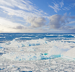 Cold, sea and snow or iceberg with climate change or dark sky, nature and environmental. Natural, ocean and water on winter season or freezing weather with global warming in and frozen in Canada