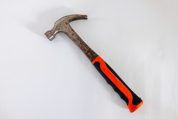 A rusty hammer on a white background