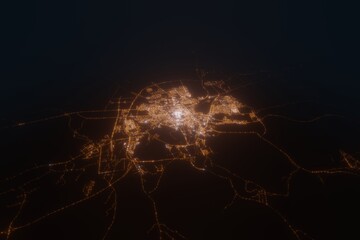Aerial view on Medina (Saudi Arabia) from north. Top view on modern city at night from space