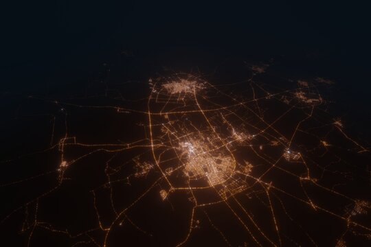 Aerial view on Buraydah and Unaizah (Saudi Arabia) from north. Top view on modern city at night from satellite