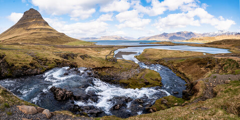 Panoramicview of Kirkjufell mountain and Kirkjufellsfoss waterfall on the Snaefellsnes Peninsula in Iceland