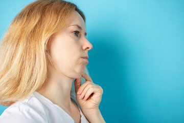 Obraz premium Double chin, woman holding facial skin, plastic surgery outcome, cosmetic procedure, neck lift.