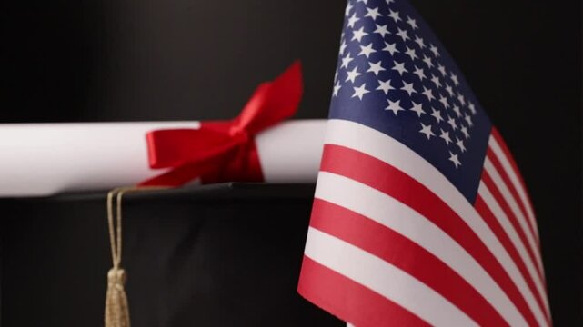 American education and language learning, graduation cap with diploma and flag of USA, international school celebrates learning success