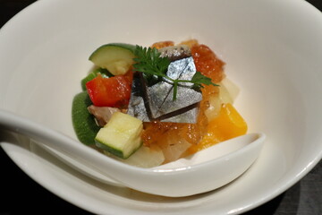 Pacific saury with kombu seaweed and autumn vegetables in Japan