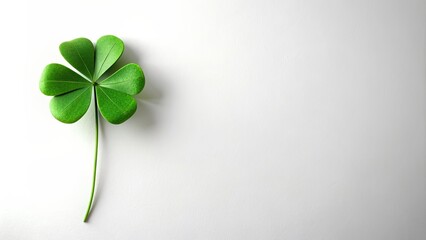 Minimalist of a shamrock on a white background, St. Patrick's Day, green, simple, abstract, modern, design, holiday, festive