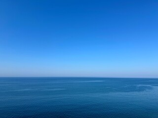 Obraz premium Blue sea calm water and clear sky
