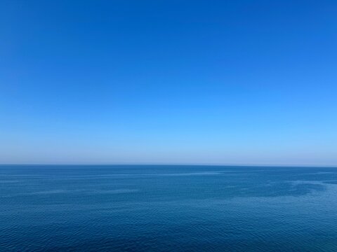 Blue sea calm water and clear sky