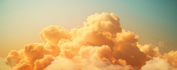  Wisps of clouds hit by yellow light from above with a bluish-yellow background