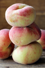 organic peach jam on wooden background