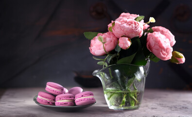 bouquet of flowers and macaroons for dessert