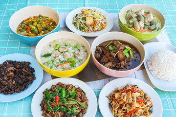 Set of dishes for healthy food on green background. Vegetarian food concept. Set of healthy vegetarian food. Vegetables, fruit, seeds, cereals, beans, spices, superfoods, herbs, Condiment for vegan.