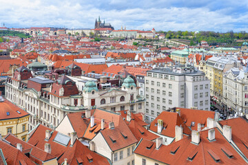Obraz premium View over Prague city red roofs and Castle, Prague, Czech Republic