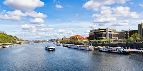 Fototapeta premium Tourist boat navigating on the Vitava River, Prague, Bohemia, Czech Republic