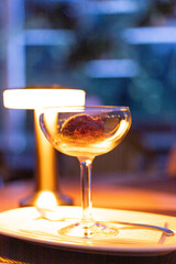 a scoop of raspberry sorbet in a glass