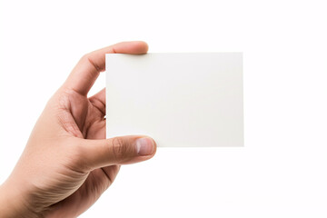 Obraz premium Hand holding a blank white card isolated on white background, ready for writing or design