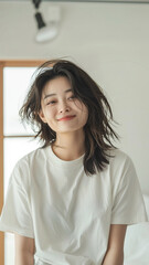A striking portrait of a young Asian woman wearing an white t-shirt, exuding natural beauty and contemporary style.