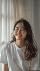 A striking portrait of a young Asian woman wearing an white t-shirt, exuding natural beauty and contemporary style.