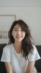A striking portrait of a young Asian woman wearing an white t-shirt, exuding natural beauty and contemporary style.