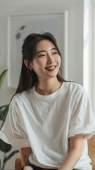 A striking portrait of a young Asian woman wearing an white t-shirt, exuding natural beauty and contemporary style.