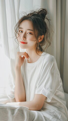 A striking portrait of a young Asian woman wearing an white t-shirt, exuding natural beauty and contemporary style.