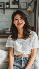 A striking portrait of a young Asian woman wearing an white t-shirt, exuding natural beauty and contemporary style.