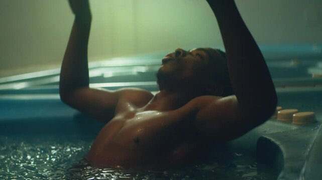 Para-runner in an Ice-bath before race